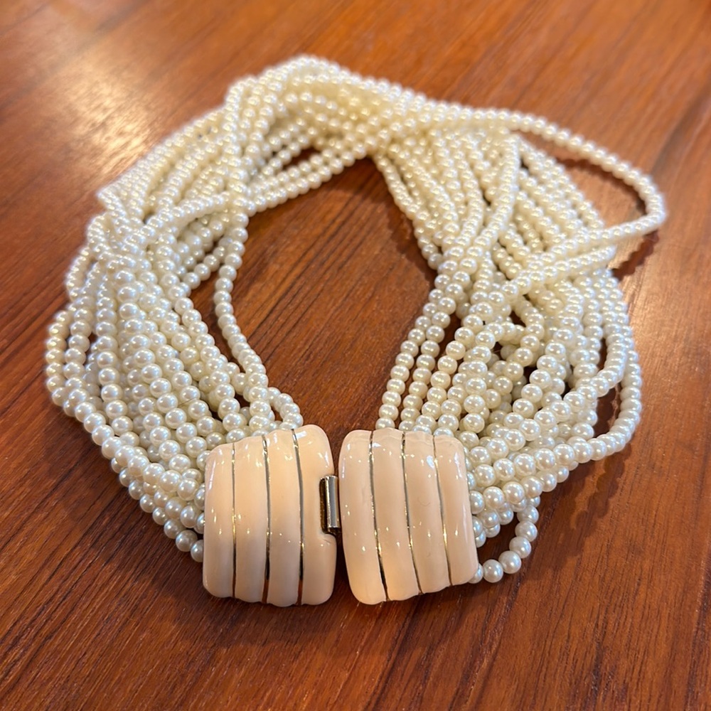 Donald Stannard pearl necklace 18 strands clasp back 17”